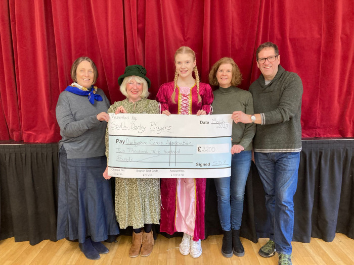 South Darley Players presented Derbyshire Carers Association with an astonishing cheque
